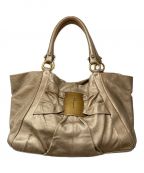 Salvatore Ferragamoサルヴァトーレ フェラガモ）の古着「ヴァラリボントートバッグ」｜ゴールド