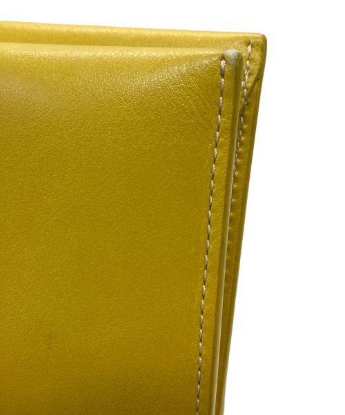 VASIC（ヴァジック）VASIC (ヴァジック) 2つ折り財布 イエローの古着・服飾アイテム