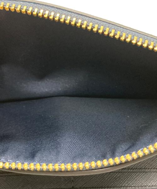 TORY BURCH（トリーバーチ）TORY BURCH (トリーバーチ) 二つ折り長財布 ネイビーの古着・服飾アイテム
