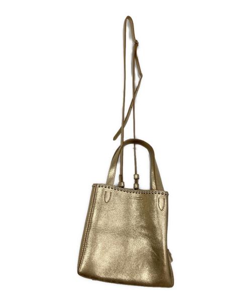 J&M DAVIDSON（ジェイ＆エム デヴィッドソン）J&M DAVIDSON (ジェイ＆エム デヴィッドソン) 2WAYバッグ ゴールドの古着・服飾アイテム