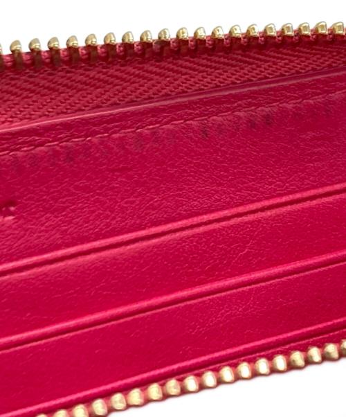 Christian Dior（クリスチャン ディオール）Christian Dior (クリスチャン ディオール) パテントラウンドジップウォレット ピンクの古着・服飾アイテム