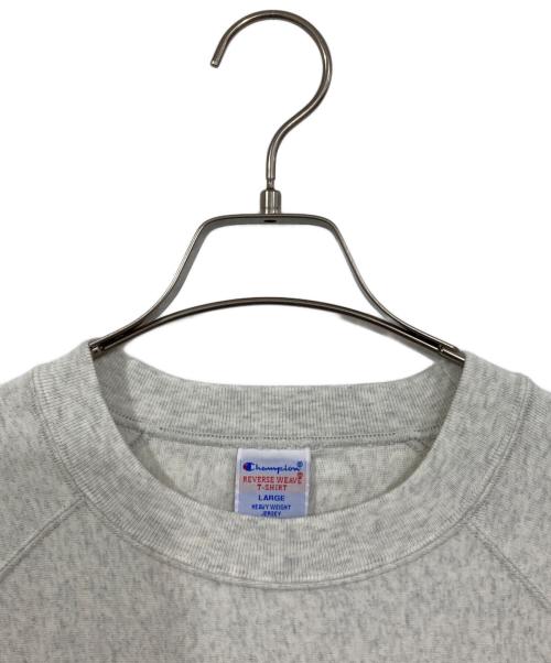 Champion（チャンピオン）Champion (チャンピオン) X-LARGE (エクストララージ) REVERSE WEAVE RAGLAN S/S TEE グレー サイズ:XLの古着・服飾アイテム