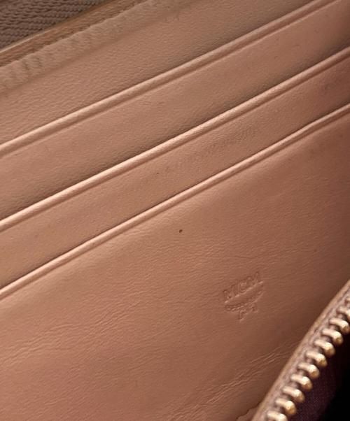MCM（エムシーエム）MCM (エムシーエム) ラウンドファスナー長財布 ゴールドの古着・服飾アイテム