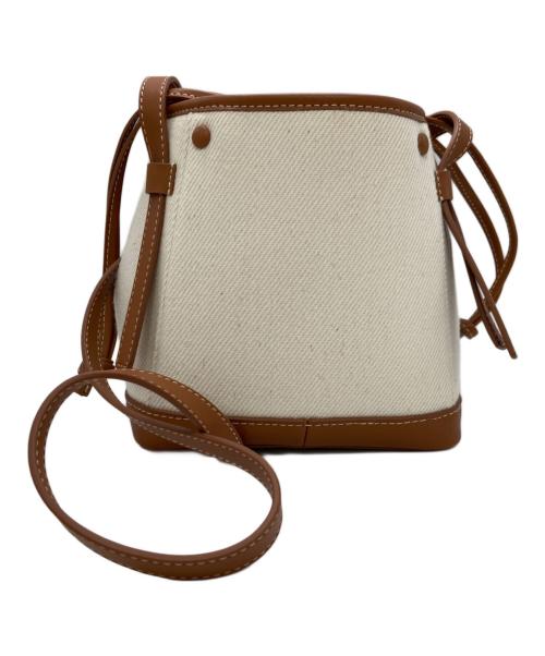 TOMORROW LAND（トゥモローランド）TOMORROW LAND (トゥモローランド) the dilettante (ザ・ディレッタント) 巾着ショルダーバッグ アイボリー×ブラウンの古着・服飾アイテム