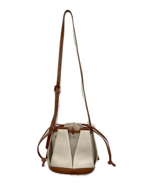 TOMORROW LAND（トゥモローランド）TOMORROW LAND (トゥモローランド) the dilettante (ザ・ディレッタント) 巾着ショルダーバッグ アイボリー×ブラウンの古着・服飾アイテム