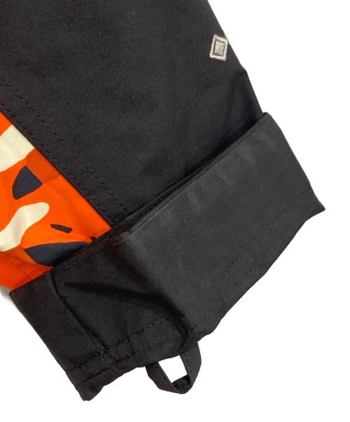 THE NORTH FACE（ザ ノース フェイス）THE NORTH FACE (ザ ノース フェイス) ノベルティマウンテンライトジャケット オレンジ×ブラック サイズ:Ⅿの古着・服飾アイテム