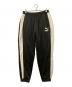 PUMA（プーマ）の古着「HE NEVERWORN T7 TRACK PANTS」｜ブラック
