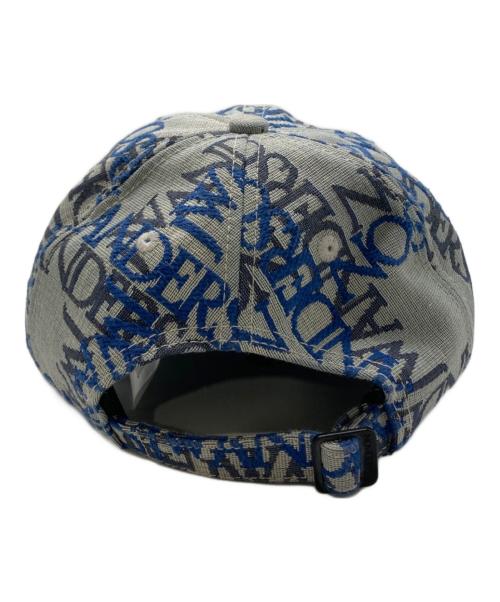 J.W.ANDERSON（ジェイダブリューアンダーソン）J.W.ANDERSON (ジェイダブリューアンダーソン) 総柄キャップ ブルーの古着・服飾アイテム