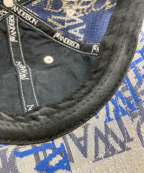 J.W.ANDERSON（ジェイダブリューアンダーソン）J.W.ANDERSON (ジェイダブリューアンダーソン) 総柄キャップ ブルーの古着・服飾アイテム