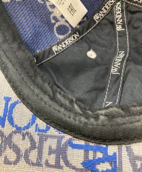 J.W.ANDERSON（ジェイダブリューアンダーソン）J.W.ANDERSON (ジェイダブリューアンダーソン) 総柄キャップ ブルーの古着・服飾アイテム