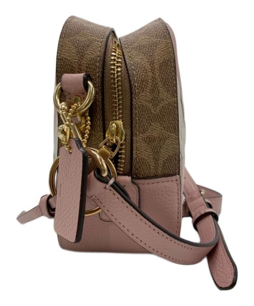 COACH（コーチ）COACH (コーチ) Disney (ディズニー) コラボカメラバッグウィズダルメシアン ピンクベージュの古着・服飾アイテム