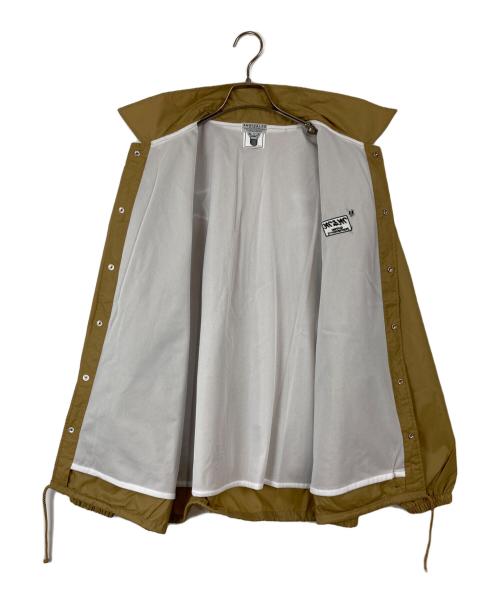m&m custom performance（エムアンドエム カスタムパフォーマンス）m&m custom performance (エムアンドエム カスタムパフォーマンス) ANRIVALED (アンライバルド) スターパッチ ウィンドブレイカー ベージュ サイズ:XLの古着・服飾アイテム