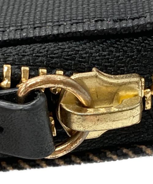 BLUE LABEL CRESTBRIDGE（ブルーレーベルクレストブリッジ）BLUE LABEL CRESTBRIDGE (ブルーレーベルクレストブリッジ) 長財布 ブラック×レッドの古着・服飾アイテム