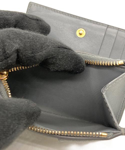 BOTTEGA VENETA（ボッテガベネタ）BOTTEGA VENETA (ボッテガベネタ) スモールカセット2つ折り財布 グレーの古着・服飾アイテム