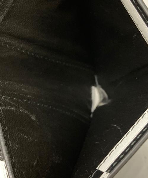 COMME des GARCONS（コムデギャルソン）COMME des GARCONS (コムデギャルソン) 2つ折り財布 ブラックの古着・服飾アイテム