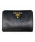 PRADA（プラダ）の古着「2つ折り財布」｜ブラック
