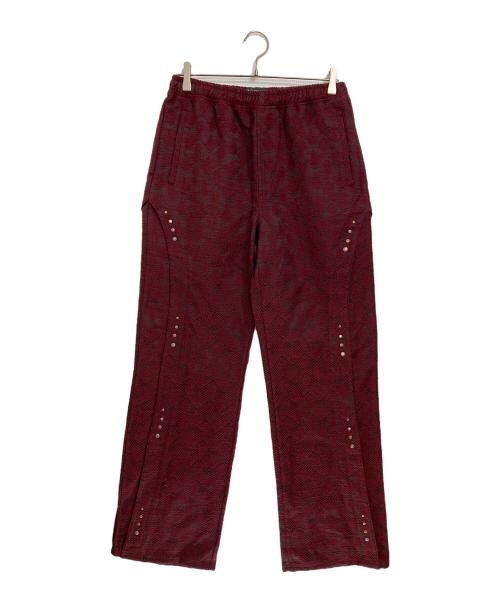 ANDERSSON BELL（アンダーソンベル）ANDERSSON BELL (アンダーソンベル) WAVE TRACK PANTS ワインレッド サイズ:48の古着・服飾アイテム