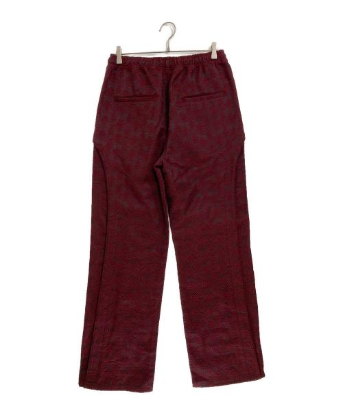 ANDERSSON BELL（アンダーソンベル）ANDERSSON BELL (アンダーソンベル) WAVE TRACK PANTS ワインレッド サイズ:48の古着・服飾アイテム