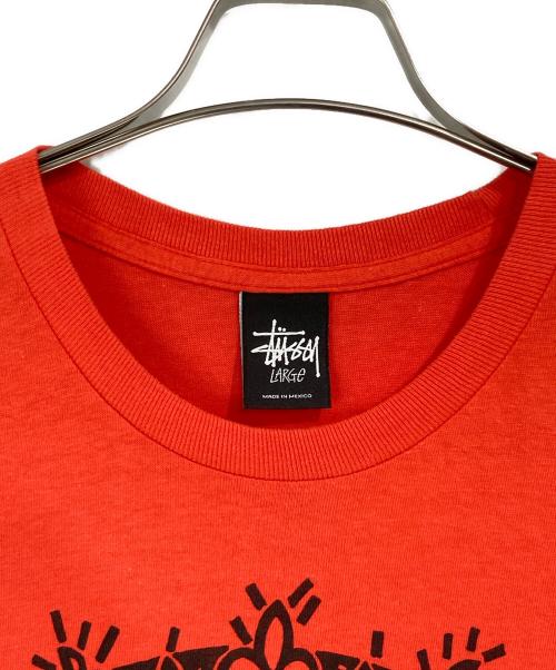 stussy（ステューシー）stussy (ステューシー) スカルプリントTシャツ オレンジ サイズ:Ｌの古着・服飾アイテム