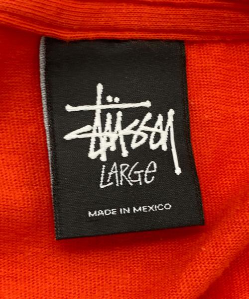 stussy（ステューシー）stussy (ステューシー) スカルプリントTシャツ オレンジ サイズ:Ｌの古着・服飾アイテム