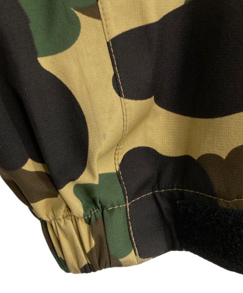 A BATHING APE（ア ベイシング エイプ）A BATHING APE (ア ベイシング エイプ) サルカモ柄マウンテンパーカー ベージュ サイズ:Sの古着・服飾アイテム