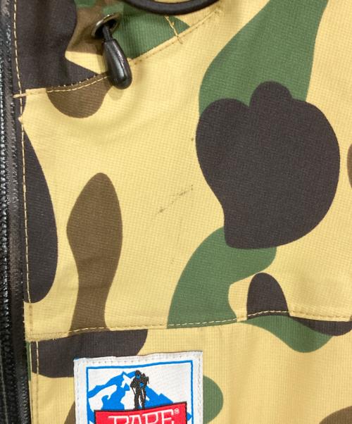 A BATHING APE（ア ベイシング エイプ）A BATHING APE (ア ベイシング エイプ) サルカモ柄マウンテンパーカー ベージュ サイズ:Sの古着・服飾アイテム