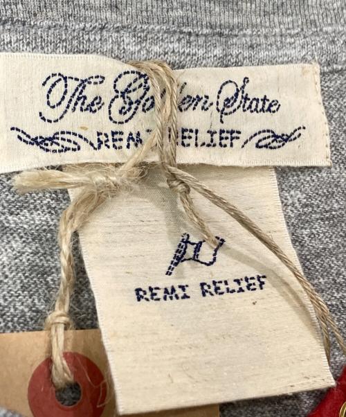 REMI RELIEF（レミレリーフ）REMI RELIEF (レミレリーフ) フットボールTシャツ グレー サイズ:FREE 未使用品の古着・服飾アイテム