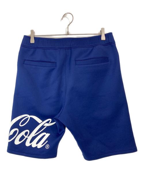 F.C.R.B.（エフシーレアルブリストル）F.C.R.B. (エフシーレアルブリストル) Coca Cola (コカコーラ) ハーフパンツ ネイビー サイズ:Mの古着・服飾アイテム