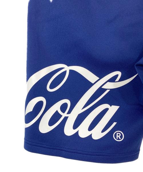 F.C.R.B.（エフシーレアルブリストル）F.C.R.B. (エフシーレアルブリストル) Coca Cola (コカコーラ) ハーフパンツ ネイビー サイズ:Mの古着・服飾アイテム