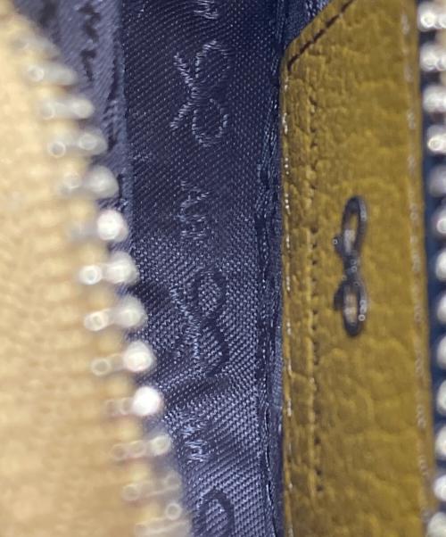 ANYA HINDMARCH（アニヤ・ハインドマーチ）ANYA HINDMARCH (アニヤ・ハインドマーチ) スマイル ウィンクコインケース イエローの古着・服飾アイテム