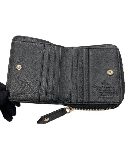 Vivienne Westwood（ヴィヴィアンウエストウッド）Vivienne Westwood (ヴィヴィアンウエストウッド) 2つ折りラウンドジップ財布 ブラックの古着・服飾アイテム