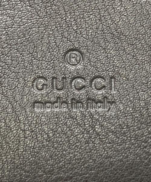 GUCCI（グッチ）GUCCI (グッチ) タッセルクラッチバッグ ブラウンの古着・服飾アイテム
