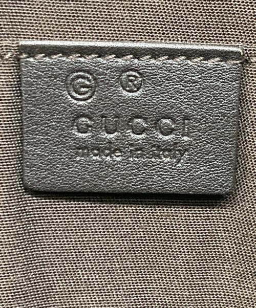 GUCCI（グッチ）GUCCI (グッチ) タッセルクラッチバッグ ブラウンの古着・服飾アイテム