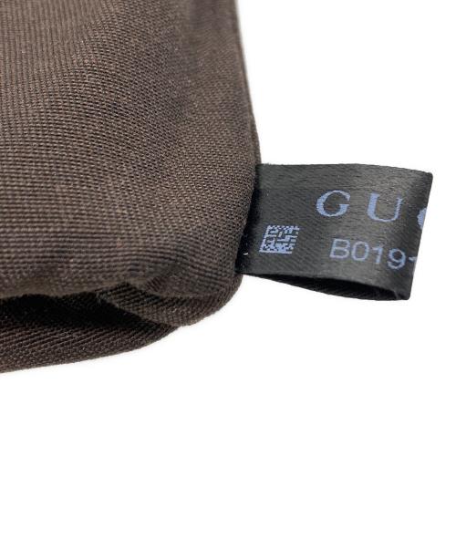 GUCCI（グッチ）GUCCI (グッチ) タッセルクラッチバッグ ブラウンの古着・服飾アイテム