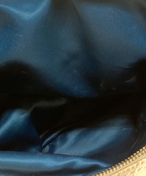 COACH（コーチ）COACH (コーチ) マギー パンチングレザー トートバッグ アイボリーの古着・服飾アイテム