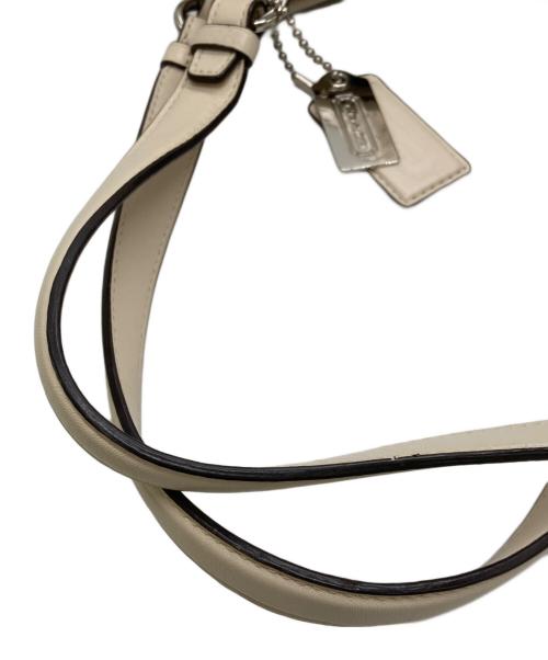 COACH（コーチ）COACH (コーチ) マギー パンチングレザー トートバッグ アイボリーの古着・服飾アイテム