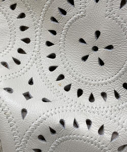 COACH（コーチ）COACH (コーチ) マギー パンチングレザー トートバッグ アイボリーの古着・服飾アイテム