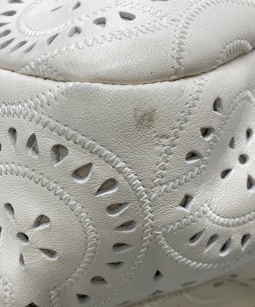 COACH（コーチ）COACH (コーチ) マギー パンチングレザー トートバッグ アイボリーの古着・服飾アイテム