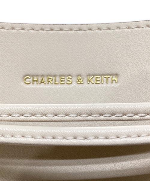 CHARLES & KEITH（チャールズアンドキース）CHARLES & KEITH (チャールズアンドキース) ドローストリングホーボーバッグ ベージュの古着・服飾アイテム