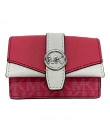 MICHAEL KORS（マイケル・コース）の古着「GREENWICH フラップ トライフォールド エクストラスモール - MKシグネチャー」｜ピンク