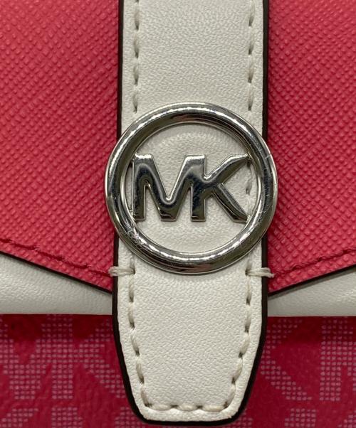 MICHAEL KORS（マイケル・コース）MICHAEL KORS (マイケル・コース) GREENWICH フラップ トライフォールド エクストラスモール - MKシグネチャー ピンクの古着・服飾アイテム