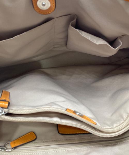 COACH（コーチ）COACH (コーチ) シグネチャーストライプキャリーオールバッグ ブルー×オレンジの古着・服飾アイテム