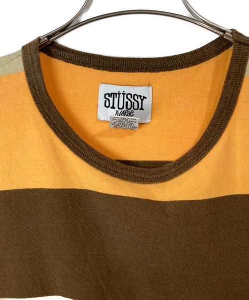 stussy（ステューシー）stussy (ステューシー) ポケットTシャツ オレンジ×ブラウン サイズ:XLの古着・服飾アイテム