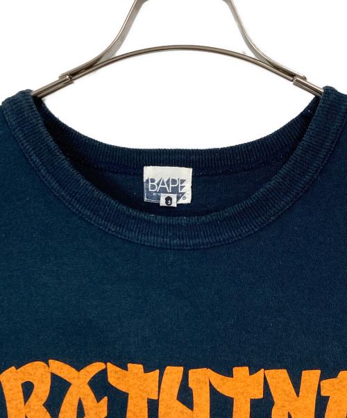 A BATHING APE（アベイシングエイプ）A BATHING APE (アベイシングエイプ) プリントTシャツ ネイビー サイズ:XLの古着・服飾アイテム