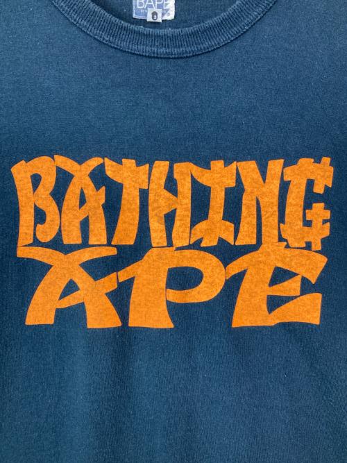 A BATHING APE（アベイシングエイプ）A BATHING APE (アベイシングエイプ) プリントTシャツ ネイビー サイズ:XLの古着・服飾アイテム