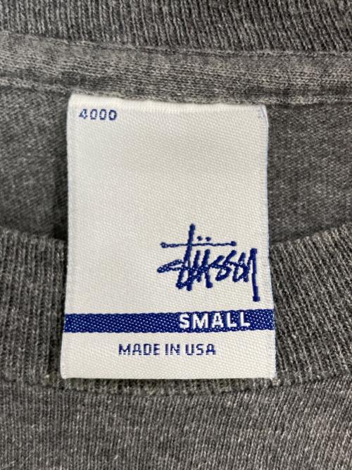 stussy（ステューシー）stussy (ステューシー) スニーカープリントロングスリーブTシャツ グレー サイズ:Sの古着・服飾アイテム