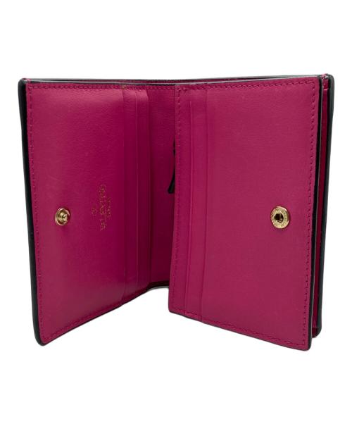 VALENTINO GARAVANI（ヴァレンティノ・ガラヴァーニ）VALENTINO GARAVANI (ヴァレンティノ・ガラヴァーニ) スタッズ2つ折り財布 ピンクの古着・服飾アイテム