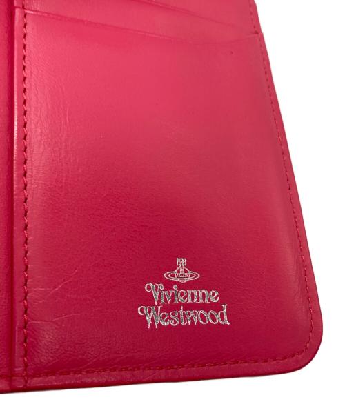 Vivienne Westwood（ヴィヴィアンウエストウッド）Vivienne Westwood (ヴィヴィアンウエストウッド) オーブ刺繍がま口財布 ピンクの古着・服飾アイテム