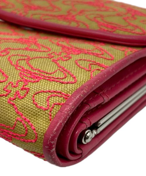 Vivienne Westwood（ヴィヴィアンウエストウッド）Vivienne Westwood (ヴィヴィアンウエストウッド) オーブ刺繍がま口財布 ピンクの古着・服飾アイテム