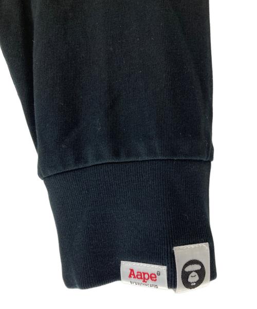 A BATHING APE（アベイシングエイプ）A BATHING APE (アベイシングエイプ) AAPE UNVS プリントロンT ブラック サイズ:Lの古着・服飾アイテム
